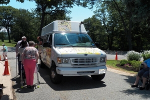 Residents of St. Joseph's Adult Care Home enjoyed Ice-Cream of the Good Humor truck in a hot s